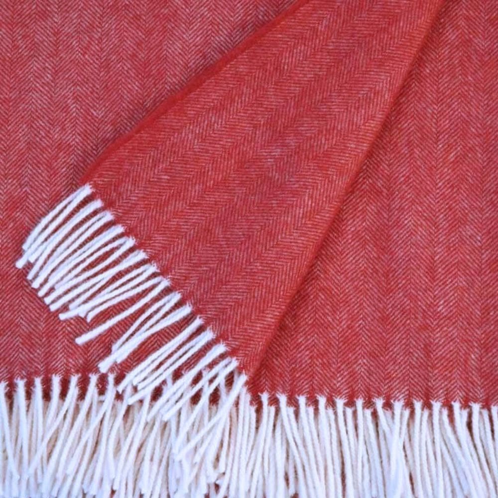 Detail van de geweven lamswol poncho